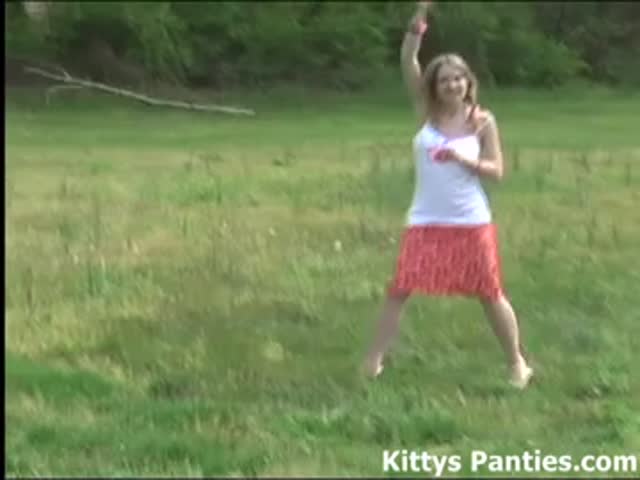 cute 18yo teen kitty flying a kite